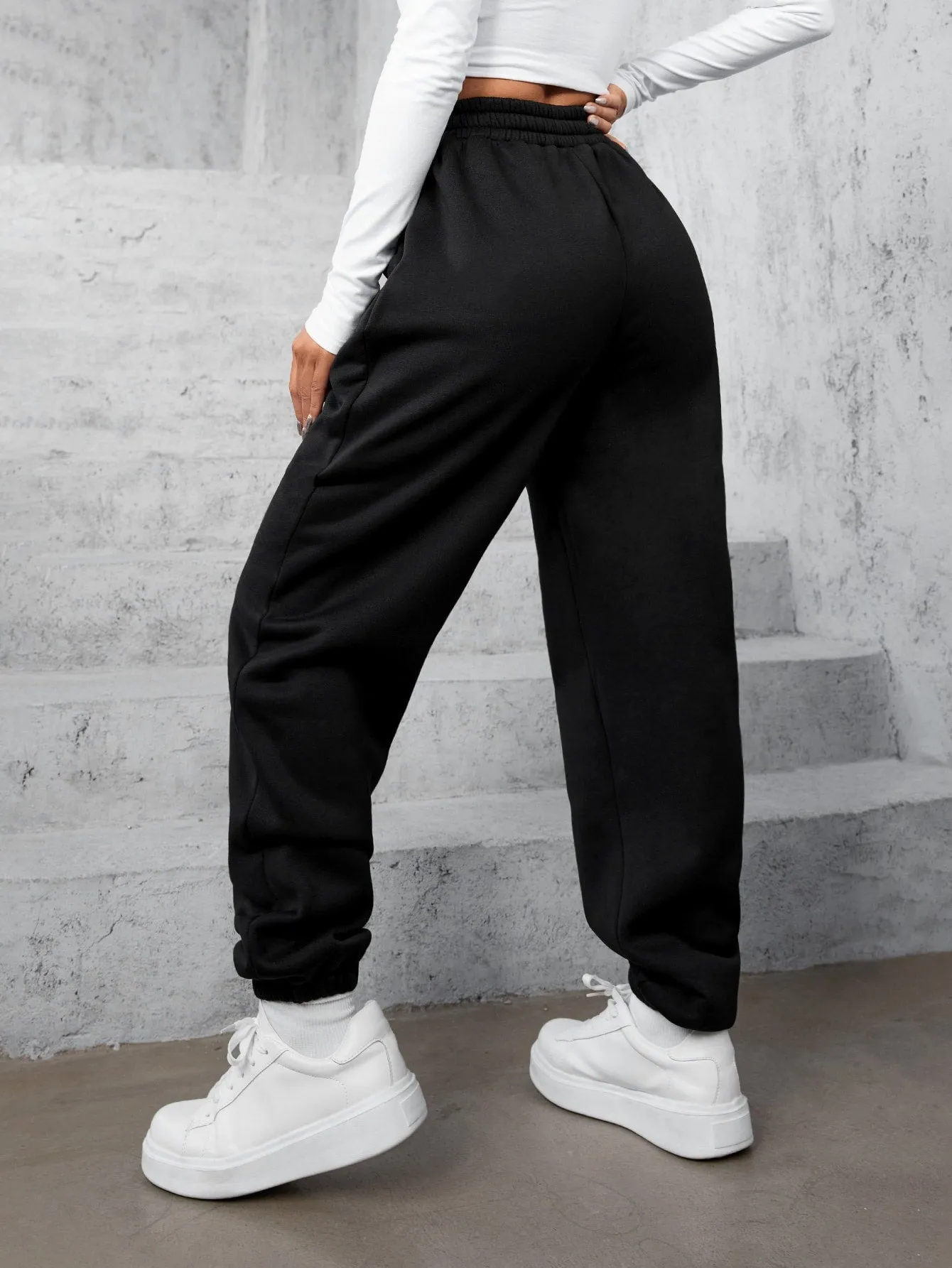 High-waisted Baggy Sweatpants Cross Waist Detail FW23