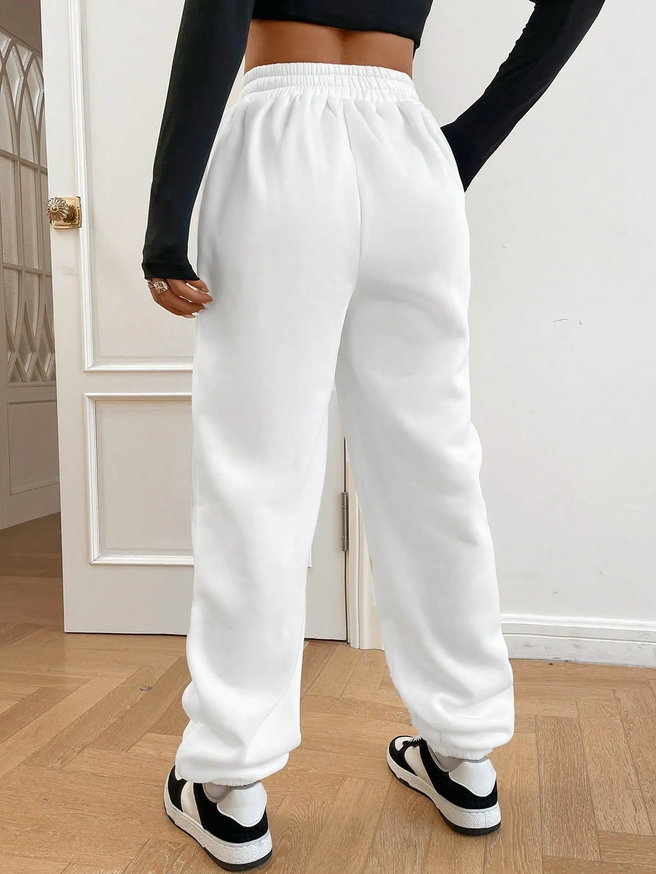 High-waisted Baggy Sweatpants Cross Waist Detail FW23